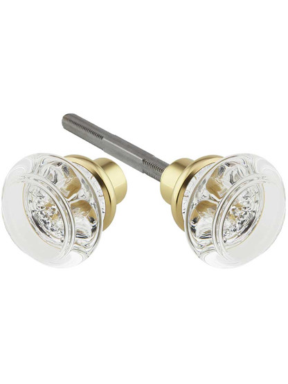 Pair of Lead Free Round Crystal Door Knobs with Brass Base in Un-Lacquered Brass.